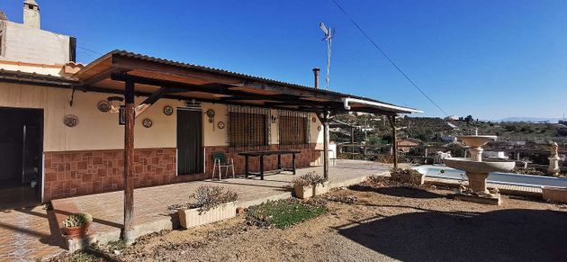 Foto 2 de Chalet en venta en Benajarafe – Almayate de 2 habitaciones con terraza y piscina