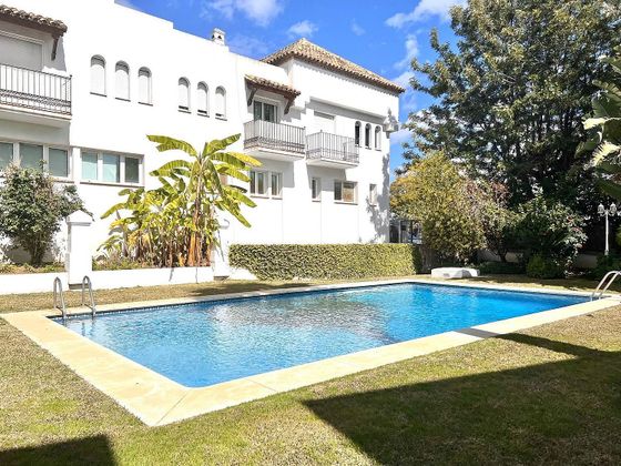 Foto 1 de Venta de casa adosada en calle Romero de Torres de 3 habitaciones con terraza y piscina