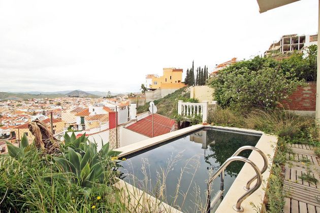 Foto 1 de Venta de chalet en Puerto de la Torre - Atabal de 4 habitaciones con terraza y piscina