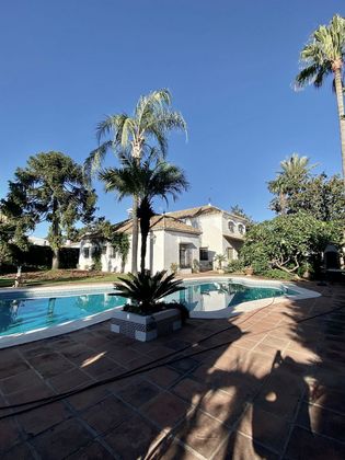 Foto 1 de Chalet en venta en Nueva Alcántara de 5 habitaciones con terraza y piscina