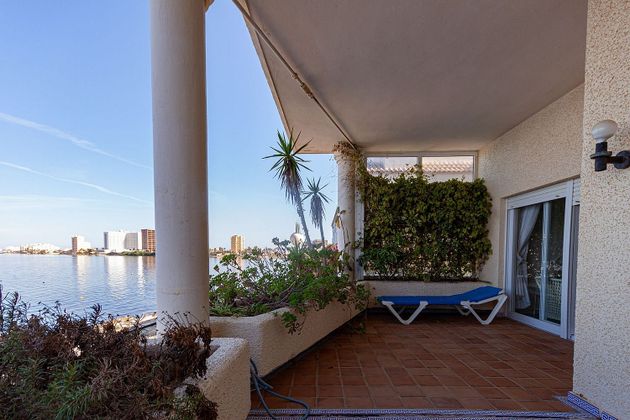Foto 2 de Piso en venta en urbanización Cabo Romano de 2 habitaciones con terraza y piscina