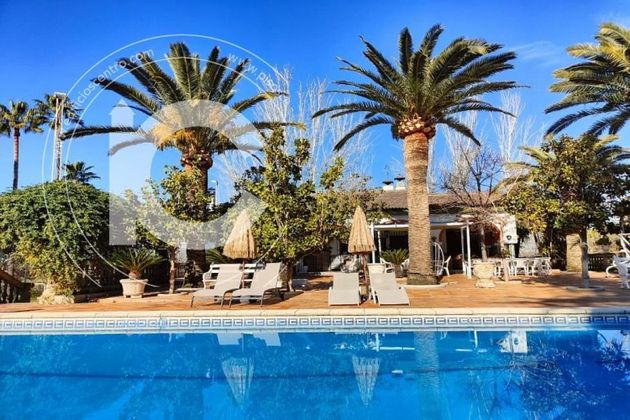 Foto 1 de Chalet en venta en Vegas del Genil de 8 habitaciones con terraza y piscina