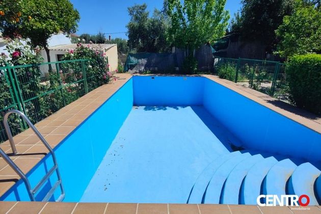 Foto 1 de Venta de chalet en Zubia (La) de 7 habitaciones con terraza y piscina