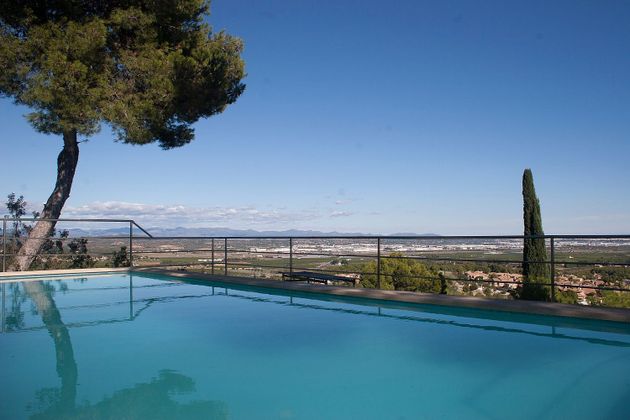 Foto 1 de Xalet en venda a urbanización El Bosque de 5 habitacions amb terrassa i piscina