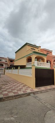Foto 1 de Casa adosada en venta en Xeraco de 3 habitaciones con terraza y garaje