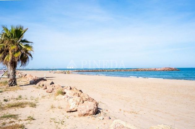 Foto 1 de Pis en venda a Playa del Puig de 3 habitacions amb terrassa i piscina