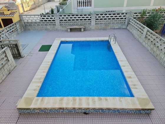 Foto 1 de Xalet en venda a El Perelló - Les Palmeres - Mareny de Barraquetes de 5 habitacions amb terrassa i piscina