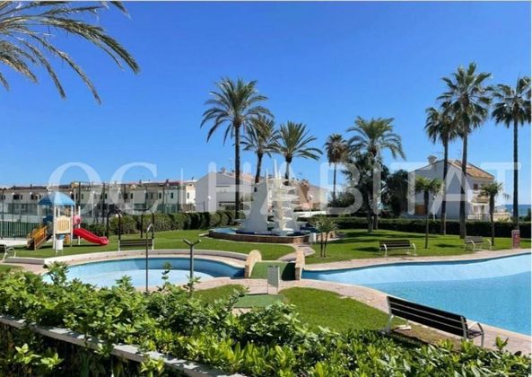 Foto 1 de Pis en venda a Playa del Puig de 2 habitacions amb piscina i jardí