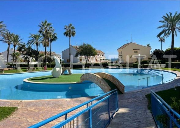 Foto 2 de Pis en venda a Playa del Puig de 2 habitacions amb piscina i jardí