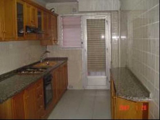 Foto 1 de Piso en venta en Torrefiel de 3 habitaciones con balcón y aire acondicionado