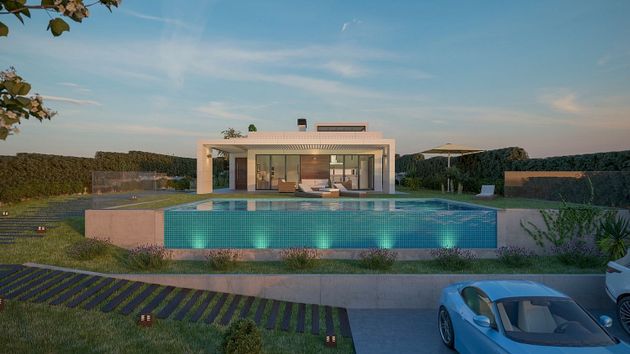 Foto 1 de Xalet en venda a urbanización Golf Guadiana de 4 habitacions amb terrassa i piscina