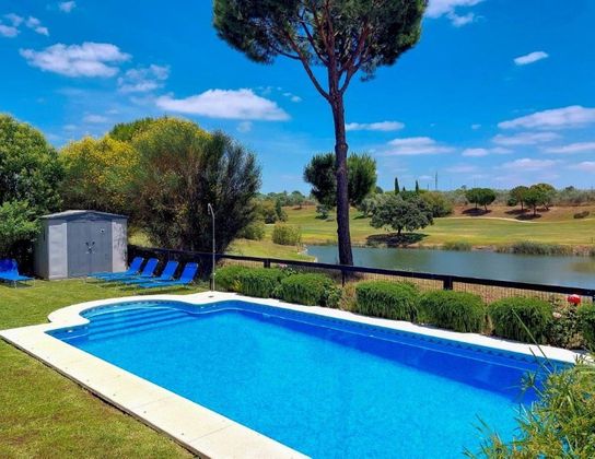 Foto 1 de Xalet en venda a Guillena de 6 habitacions amb piscina i jardí