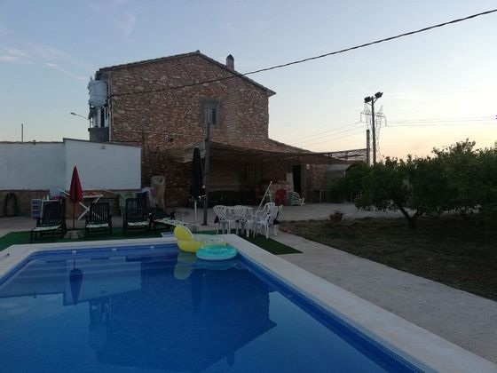 Foto 2 de Venta de casa rural en calle Pla de Museros de 4 habitaciones con terraza y piscina