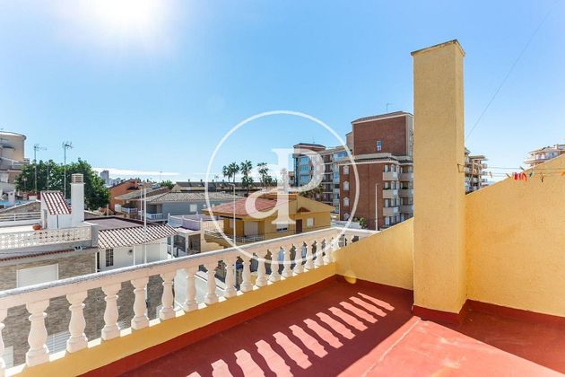 Foto 1 de Venta de casa adosada en El Perelló - Les Palmeres - Mareny de Barraquetes de 5 habitaciones con terraza y piscina