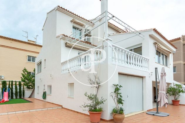 Foto 1 de Chalet en venta en Oliva Playa de 4 habitaciones con terraza y jardín