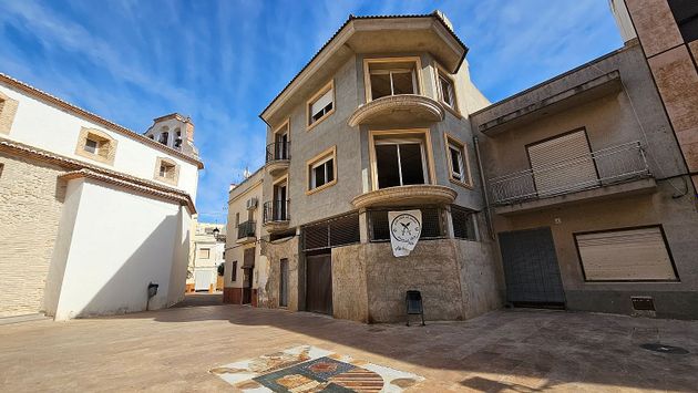 Foto 1 de Venta de casa adosada en plaza Rector Pons de 6 habitaciones con terraza y garaje