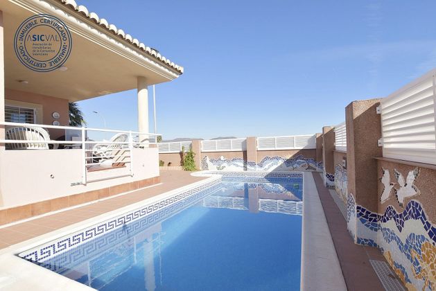 Foto 1 de Venta de chalet en Rafelbuñol/Rafelbunyol de 5 habitaciones con terraza y piscina