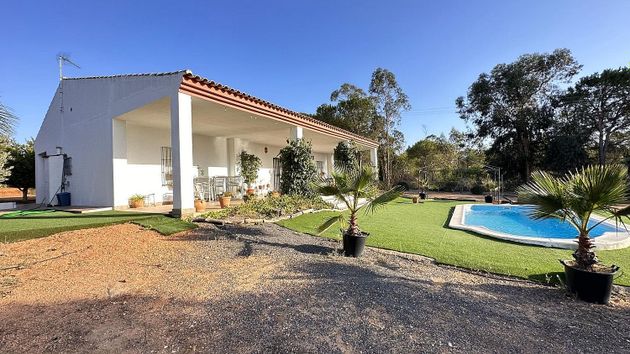 Foto 1 de Casa en venda a Cartaya de 4 habitacions amb piscina i jardí