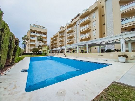 Foto 1 de Piso en alquiler en Playa de Granada de 2 habitaciones con terraza y piscina