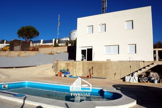 Foto 1 de Xalet en venda a urbanización Altury de 5 habitacions amb piscina i garatge