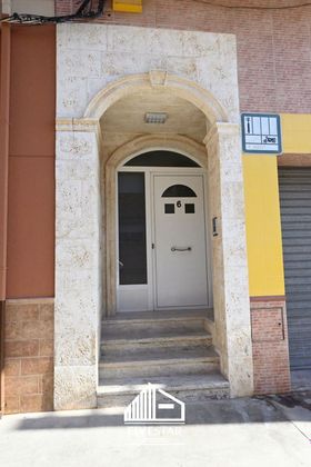Foto 2 de Casa adossada en venda a calle Alzira de 3 habitacions amb terrassa i garatge