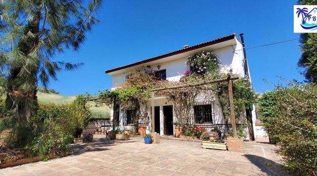 Foto 1 de Casa en venda a Riogordo de 5 habitacions amb terrassa i jardí