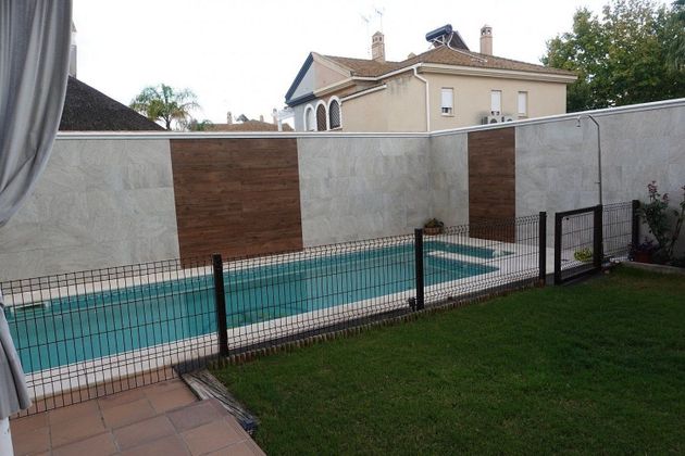 Foto 1 de Casa en venda a Utrera de 4 habitacions amb piscina i garatge