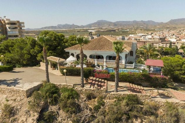 Foto 1 de Chalet en venta en Puerto de Mazarrón de 6 habitaciones con terraza y piscina