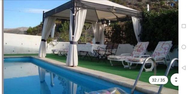 Foto 1 de Chalet en venta en Águilas ciudad de 5 habitaciones con terraza y piscina
