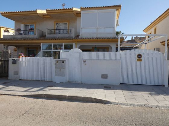Foto 1 de Casa adossada en venda a El Mojón de 2 habitacions amb jardí i balcó