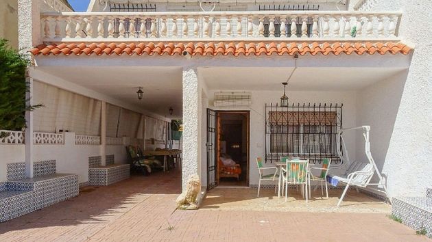 Foto 1 de Casa en venta en Puerto de Mazarrón de 5 habitaciones con terraza y garaje