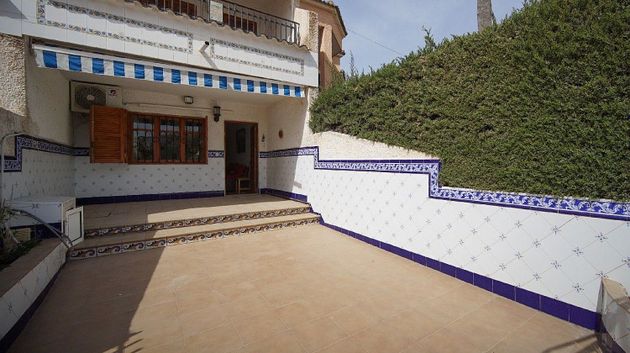 Foto 1 de Casa adossada en venda a Puerto de Mazarrón de 3 habitacions amb terrassa i jardí