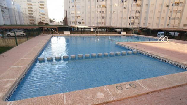 Foto 2 de Pis en venda a Playa de Gandia de 3 habitacions amb terrassa i piscina