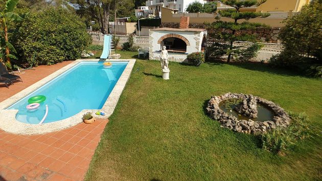 Foto 1 de Xalet en venda a urbanización Tossal Gross de 5 habitacions amb terrassa i piscina