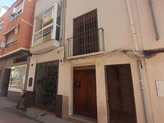 Foto 1 de Casa adosada en venta en Centro - Gandia de 7 habitaciones con terraza