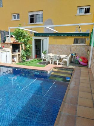 Foto 1 de Casa adossada en venda a Daimús de 3 habitacions amb terrassa i piscina