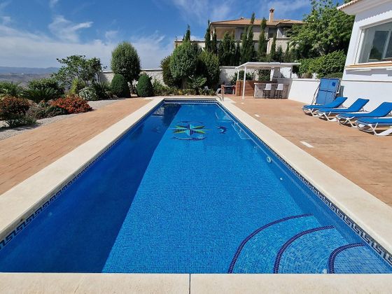Foto 2 de Xalet en venda a urbanización Vista del Lago de 5 habitacions amb terrassa i piscina