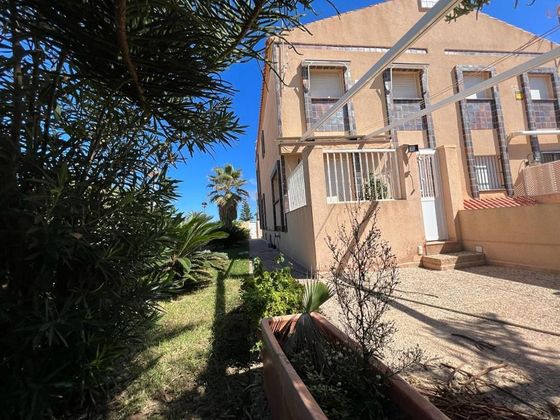 Foto 2 de Venta de casa en calle Chalet Playa Galua de 4 habitaciones con terraza y jardín