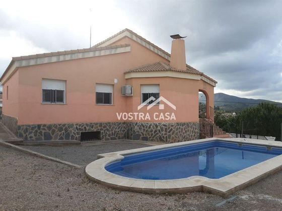 Foto 1 de Casa en venda a Las Pedrizas de 4 habitacions amb piscina i garatge