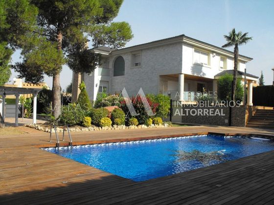 Foto 1 de Casa en venta en La Alcayna de 7 habitaciones con piscina y garaje