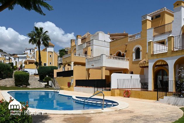 Foto 2 de Venta de casa adosada en calle Las Atalayas de 2 habitaciones con terraza y piscina