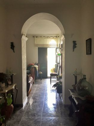 Foto 1 de Casa adossada en venda a Santa Olalla del Cala de 4 habitacions amb terrassa i jardí