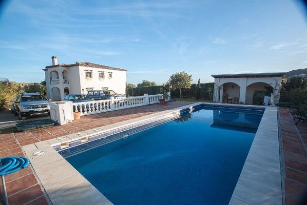 Foto 2 de Casa rural en venda a calle Los Pedregales de 4 habitacions amb terrassa i piscina