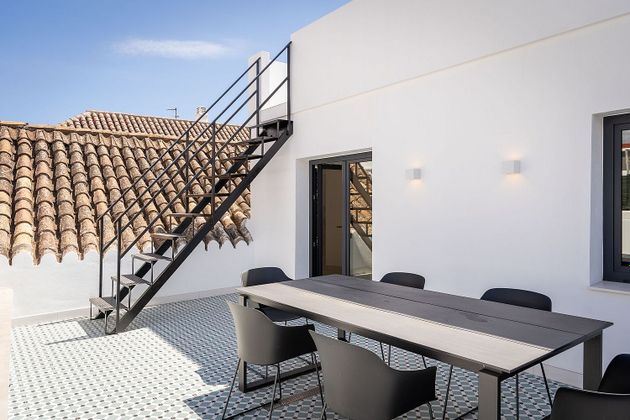 Foto 2 de Casa adossada en venda a Centro Urbano de 4 habitacions amb terrassa i aire acondicionat