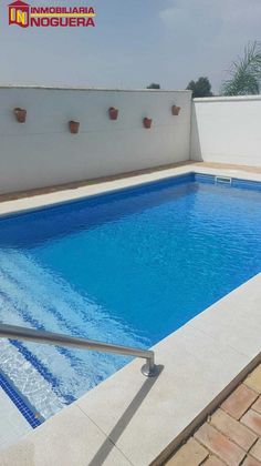 Foto 2 de Chalet en venta en Cañada Rosal de 4 habitaciones con terraza y piscina