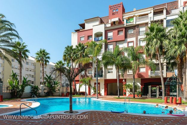 Foto 1 de Piso en venta en Playa de Granada de 2 habitaciones con terraza y piscina