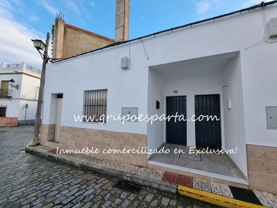 Foto 2 de Venta de casa adosada en calle Cardenal Delgado de 3 habitaciones con jardín y aire acondicionado