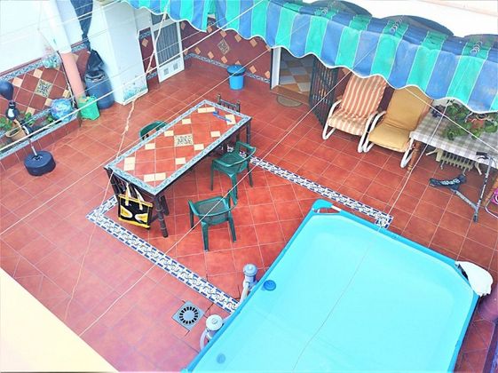 Foto 2 de Casa adossada en venda a Los Molinos de 4 habitacions amb terrassa i garatge