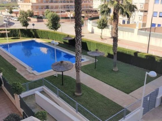 Foto 1 de Alquiler de piso en Canet d´En Berenguer de 2 habitaciones con terraza y piscina