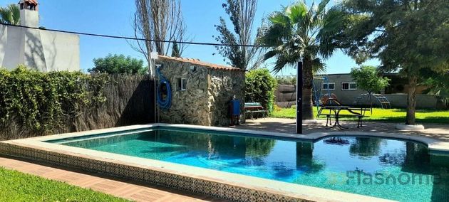 Foto 1 de Venta de chalet en Villanueva de la Serena de 2 habitaciones con piscina y jardín